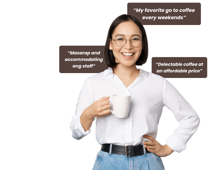 A woman smiling and holding a cup of coffee